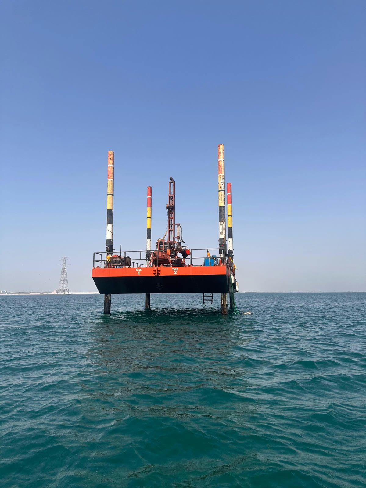 Jack-up barge working in shallow water
